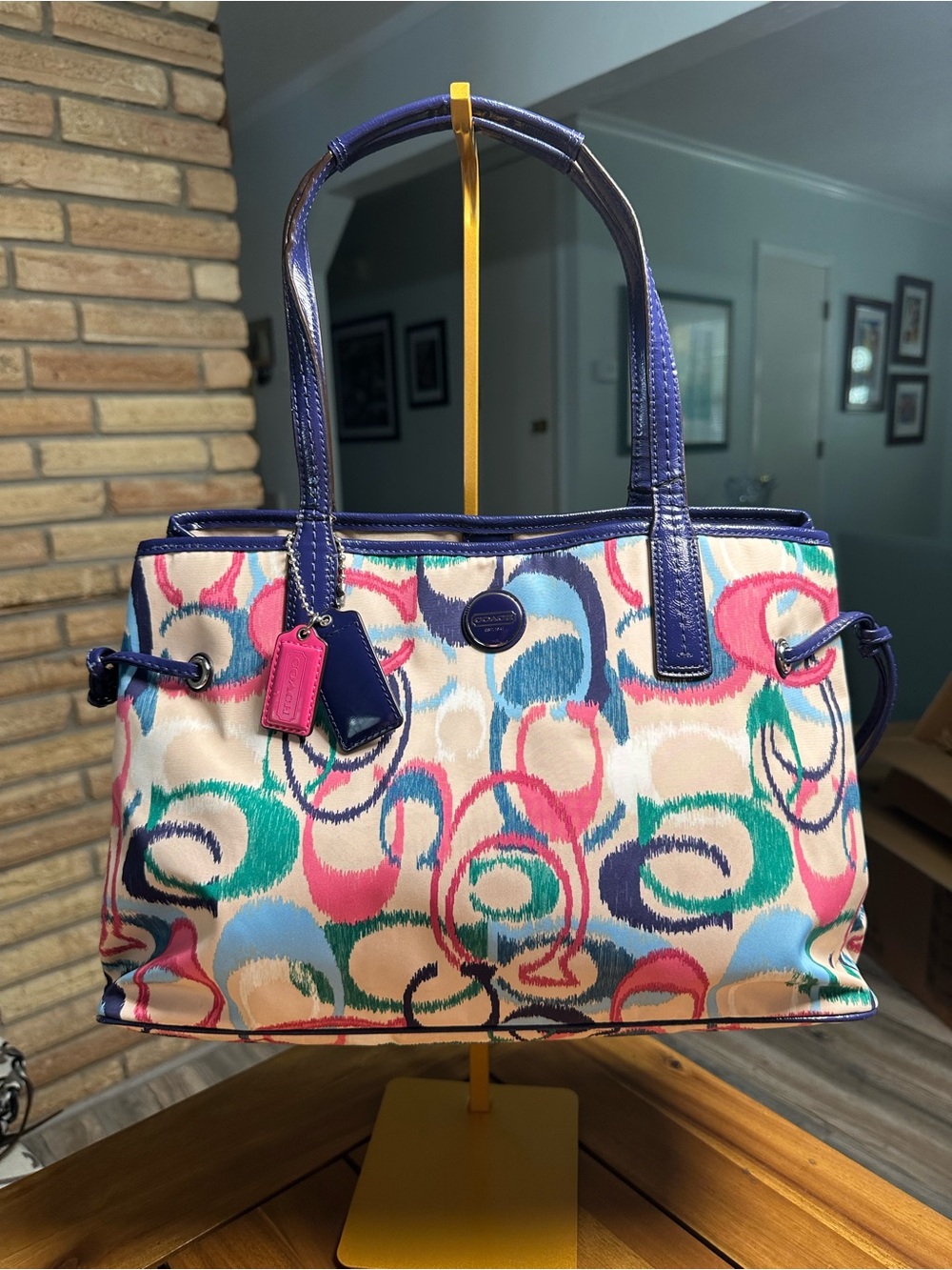 Coach Ikat Carryall in multi colored C print and navy patent trim